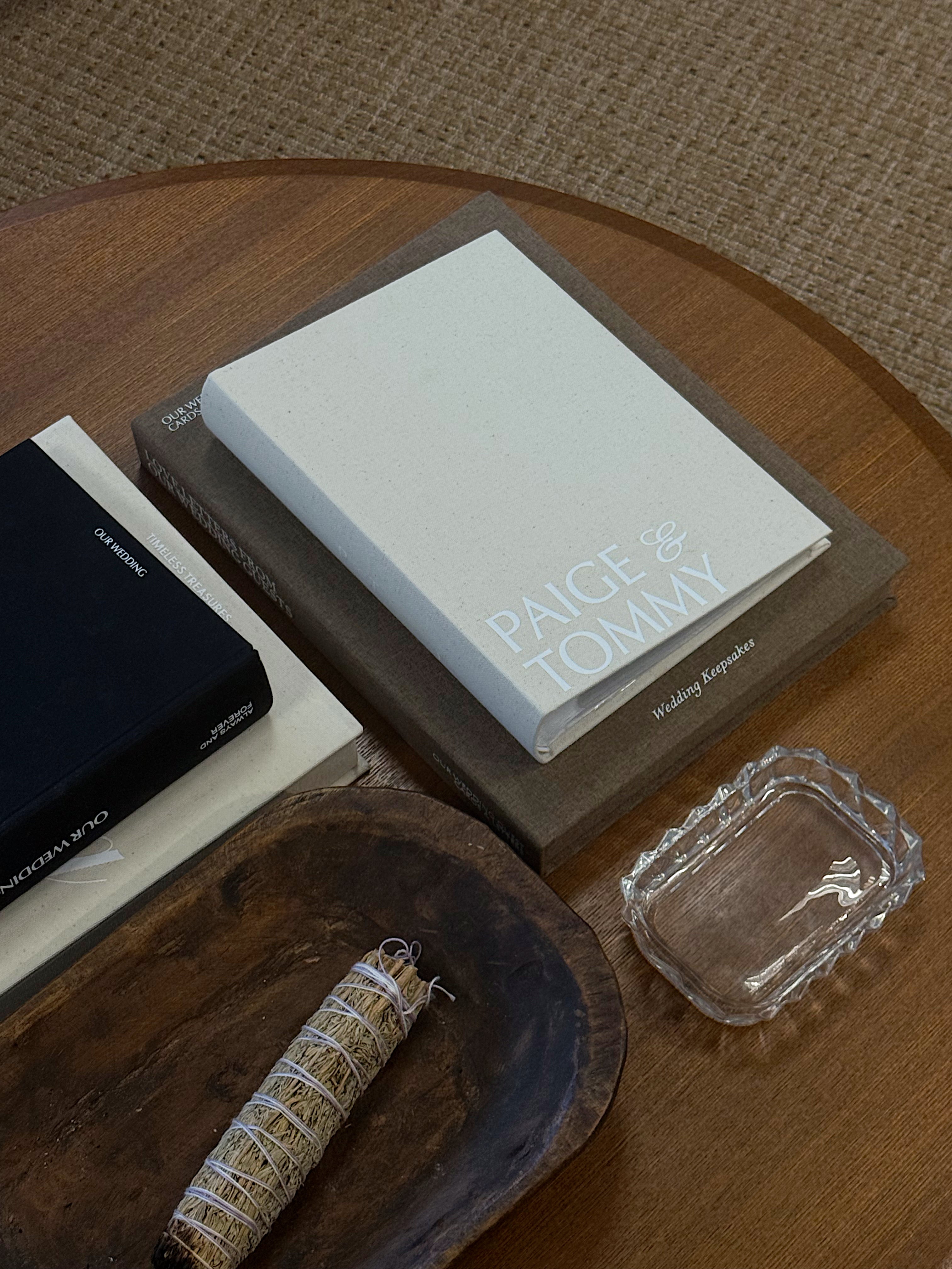 Personalized wedding photo album with custom couple names on linen cover for modern brides