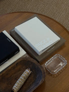 Personalized wedding photo album with custom couple names on linen cover for modern brides